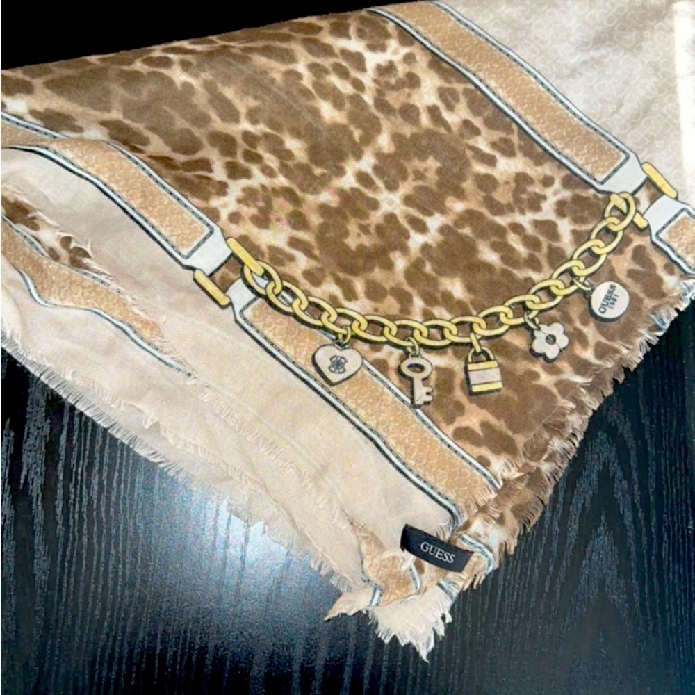 Used in good condition GUESS TAN GOLD SHAWL